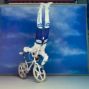 Nourie handstand in his father's photo studio